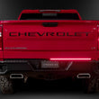 Load image into Gallery viewer, Putco 21-23 Ford F-150 60In Direct Fit Red Blade Kit Tailgate Bars w Factory LED Taillamps - Back View
