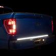 Load image into Gallery viewer, Putco 21-23 Ford F-150 60In Direct Fit Red Blade Kit Tailgate Bars w Factory LED Taillamps - Additional View 5