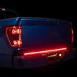 Load image into Gallery viewer, Putco 21-23 Ford F-150 60In Direct Fit Red Blade Kit Tailgate Bars w Factory LED Taillamps - Additional View 10