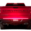 Load image into Gallery viewer, Putco 60in Red Blade LED Tailgate Light Bar for Ford Turcks w/ Blis and Trailer Detection - Side View