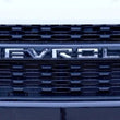 Load image into Gallery viewer, Putco 19-20 Chevy Silverado LD - Grille Letters - Stainless Steel Chevrolet Letters - Side View