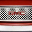 Load image into Gallery viewer, Putco 00-06 GMC Yukon XL - w/ Logo CutOut Punch Stainless Steel Grilles - Side View