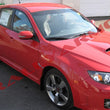 Load image into Gallery viewer, Rally Armor 08-11 Subaru STI (Hatch Only) / 11-14 WRX (Hatch Only) Black UR Mud Flap w/Red Logo - Side View