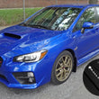 Load image into Gallery viewer, Rally Armor 15-21 Subaru WRX/STI Black UR Mud Flap w/White Logo - Additional View 6