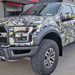 Load image into Gallery viewer, Rally Armor 17-20 Ford F-150 Raptor Gen 2 Black UR Mud Flap w/Dark Grey Logo - Installation View