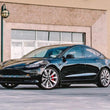 Load image into Gallery viewer, Rally Armor 17-23 Tesla Model 3 Black UR Mud Flap w/Dark Grey Logo - Additional View 6