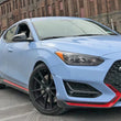Load image into Gallery viewer, Rally Armor 19-22 Hyundai Veloster N Black UR Mud Flap w/ White Logo - Back View