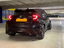 Load image into Gallery viewer, Rally Armor 20-25 Toyota GR Yaris Black Mud Flap w/White Logo - Installation View
