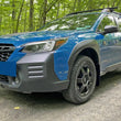 Load image into Gallery viewer, Rally Armor 22-25 Subaru Outback Wilderness Black Mud Flap Wild Orange Logo - Detail View