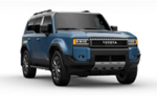 Load image into Gallery viewer, Rally Armor 22-25 Toyota Land Cruiser Black UR Mud Flap Light Blue Logo - Back View