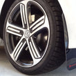 Load image into Gallery viewer, Rally Armor Black UR Mud Flap w/ Red Logo fits 2015-2019 Volkswagen Golf R - Installation View