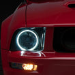 Load image into Gallery viewer, Raxiom 05-09 Ford Mustang GT V6 Axial Series CCFL Halo Projector Headlight- Blk Housing (Smkd Lens) - Main Product View
