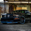 Load image into Gallery viewer, Raxiom 05-09 Ford Mustang GT V6 Axial Series CCFL Halo Projector Headlight- Blk Housing (Smkd Lens) - Additional View 10