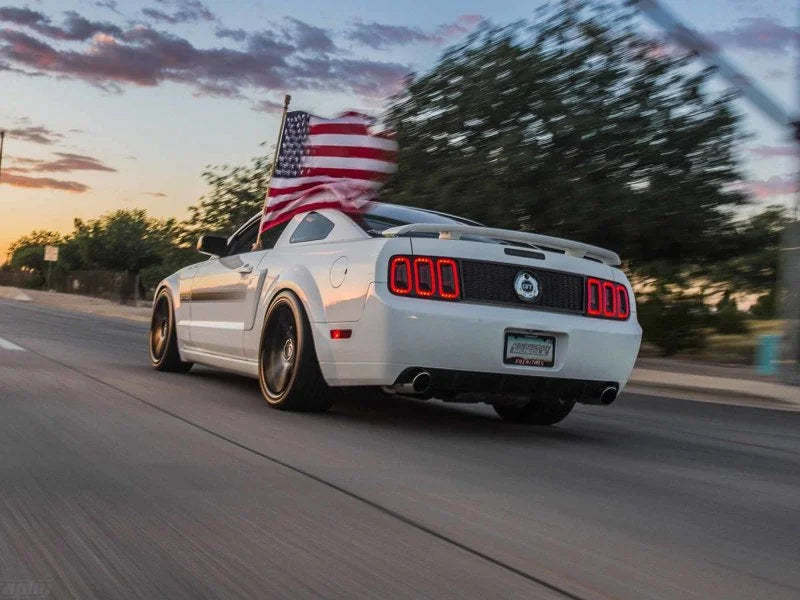 Raxiom 05-09 Ford Mustang Gen5 Tail Lights- Black Housing (Smoked Lens) - Installation View