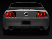 Load image into Gallery viewer, Raxiom 05-09 Ford Mustang Gen5 Tail Lights- Black Housing (Smoked Lens) - Additional View 13