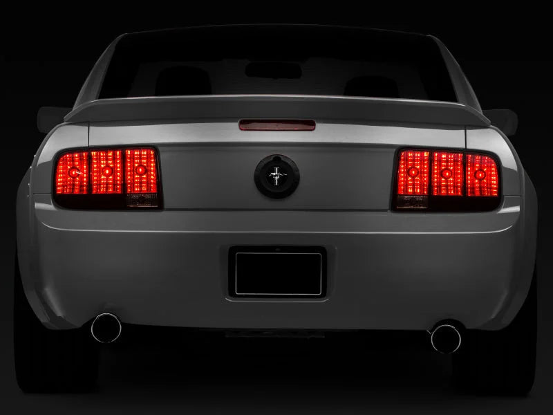 Raxiom 05-09 Ford Mustang Tail Lights- Black Housing (Smoked Lens) - Side View