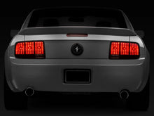 Load image into Gallery viewer, Raxiom 05-09 Ford Mustang Tail Lights- Black Housing (Smoked Lens) - Side View
