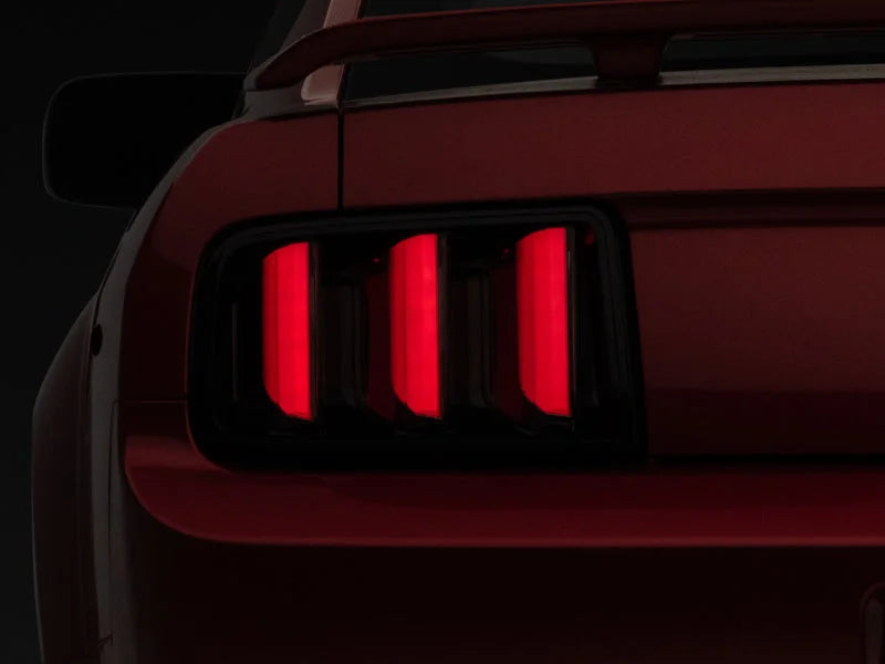 Raxiom 05-09 Ford Mustang Vector V2 LED Tail Lights- Black Housing (Smoked Lens) - Main Product View