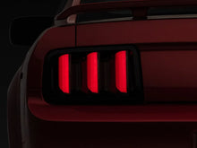 Load image into Gallery viewer, Raxiom 05-09 Ford Mustang Vector V2 LED Tail Lights- Black Housing (Smoked Lens) - Main Product View
