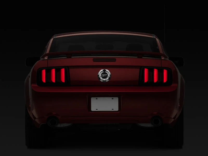 Raxiom 05-09 Ford Mustang Vector V2 LED Tail Lights- Black Housing (Smoked Lens) - Additional View 9