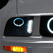 Load image into Gallery viewer, Raxiom 05-09 Ford Mustang w/ Halogen LED Halo Prjctr Headlights-Blk Hsng(Smoked Lens Exclude GT500) - Main Product View