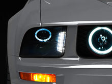 Load image into Gallery viewer, Raxiom 05-09 Ford Mustang w/ Halogen LED Halo Prjctr Headlights-Blk Hsng(Smoked Lens Exclude GT500) - Main Product View