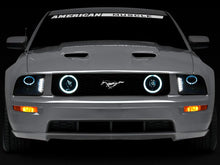 Load image into Gallery viewer, Raxiom 05-09 Ford Mustang w/ Halogen LED Halo Prjctr Headlights-Blk Hsng(Smoked Lens Exclude GT500) - Installation View