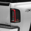 Load image into Gallery viewer, Raxiom 07-13 Chevy Silverado 1500 G2 LED Tail Lights- Black Housing (Clear Lens) - Main Product View