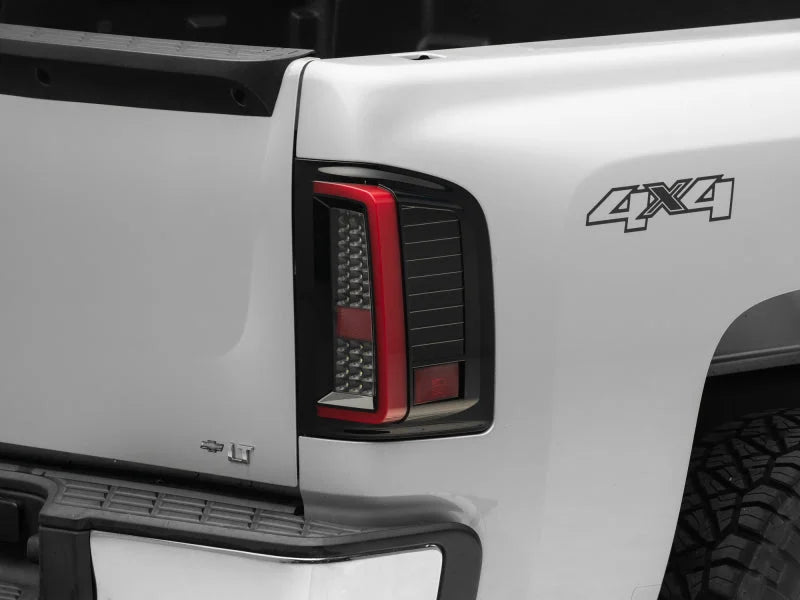 Raxiom 07-13 Chevy Silverado 1500 G2 LED Tail Lights- Black Housing (Clear Lens) - Main Product View