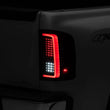 Load image into Gallery viewer, Raxiom 07-13 Chevy Silverado 1500 G2 LED Tail Lights- Black Housing (Clear Lens) - Installation View