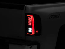 Load image into Gallery viewer, Raxiom 07-13 Chevy Silverado 1500 G2 LED Tail Lights- Black Housing (Clear Lens) - Installation View