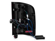 Load image into Gallery viewer, Raxiom 07-13 Chevy Silverado 1500 G2 LED Tail Lights- Black Housing (Clear Lens) - Additional View 8