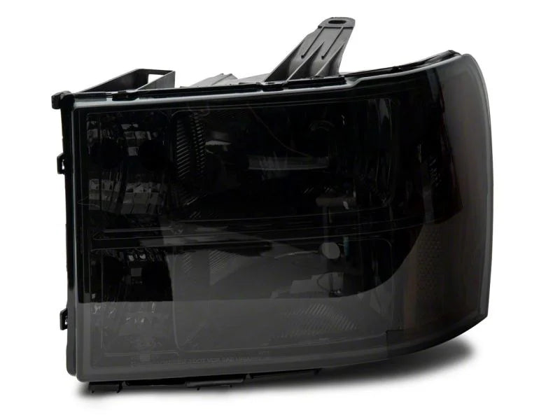 Raxiom 07-14 GMC Sierra 1500/2500 HD/3500 HD Axial OEM Rep Headlights- Chrome Housing- Smoked Lens - Side View