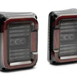 Load image into Gallery viewer, Raxiom 07-18 Jeep Wrangler JK Axial Series LED Halo Tail Lights- Black Housing (Dark Smoked Lens) - Side View
