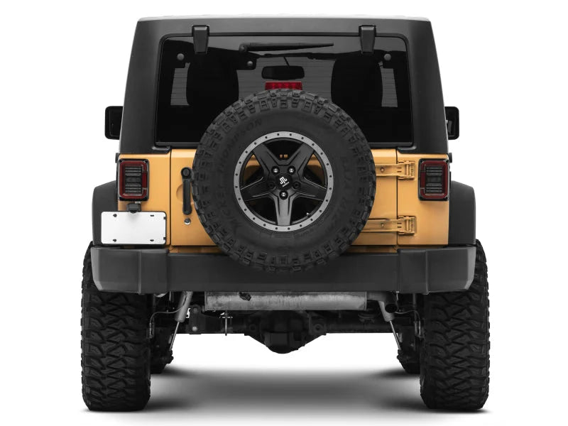 Raxiom 07-18 Jeep Wrangler JK Axial Series LED Halo Tail Lights- Black Housing (Dark Smoked Lens) - Installation View
