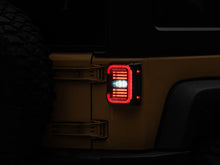 Load image into Gallery viewer, Raxiom 07-18 Jeep Wrangler JK Axial Series LED Halo Tail Lights- Black Housing (Dark Smoked Lens) - Additional View 12