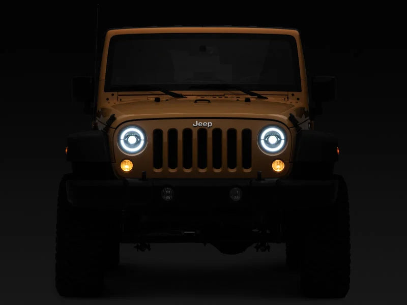 Raxiom 07-18 Jeep Wrangler JK Axial Series LED Headlights- Black Housing (Clear Lens) - Side View