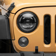 Load image into Gallery viewer, Raxiom 07-18 Jeep Wrangler JK Axial Series LED Headlights- Black Housing (Clear Lens) - Installation View