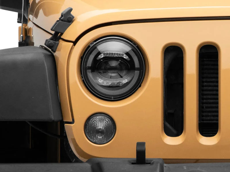 Raxiom 07-18 Jeep Wrangler JK Axial Series LED Headlights- Black Housing (Clear Lens) - Installation View