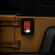 Load image into Gallery viewer, Raxiom 07-18 Jeep Wrangler JK LED Tail Lights- Black Housing (Smoked Lens) - Additional View 5