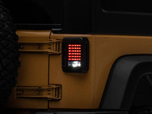 Load image into Gallery viewer, Raxiom 07-18 Jeep Wrangler JK LED Tail Lights- Black Housing (Smoked Lens) - Additional View 5