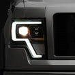 Load image into Gallery viewer, Raxiom 09-14 Ford F-150 G4 Projector Headlights- Black Housing (Clear Lens) - Main Product View