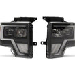 Load image into Gallery viewer, Raxiom 09-14 Ford F-150 G4 Projector Headlights- Black Housing (Clear Lens) - Back View