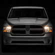 Load image into Gallery viewer, Raxiom 09-18 Dodge RAM 1500 Axial OEM Rep Headlights w/ Single Bulb- Chrome Housing (Clear Lens) - Additional View 6