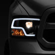 Load image into Gallery viewer, Raxiom 09-18 RAM 1500 LED Halo Projector Headlights- Black Housing (Clear Lens) - Main Product View