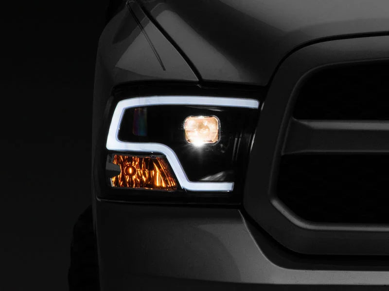 Raxiom 09-18 RAM 1500 LED Halo Projector Headlights- Black Housing (Clear Lens) - Main Product View