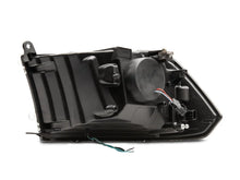 Load image into Gallery viewer, Raxiom 09-18 RAM 1500 LED Halo Projector Headlights- Black Housing (Clear Lens) - Side View