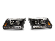 Load image into Gallery viewer, Raxiom 09-18 RAM 1500 LED Projector Headlights w/ Switchback Turn Signals- Blk Housing (Clear Lens) - Back View