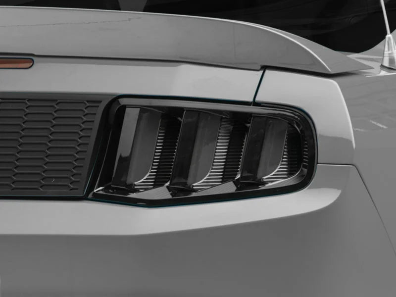 Raxiom 10-12 Ford Mustang Vector V2 LED Tail Lights - Gloss Black Housing (Clear Lens) - Side View