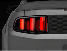 Load image into Gallery viewer, Raxiom 10-12 Ford Mustang Vector V2 LED Tail Lights - Gloss Black Housing (Clear Lens) - Additional View 10